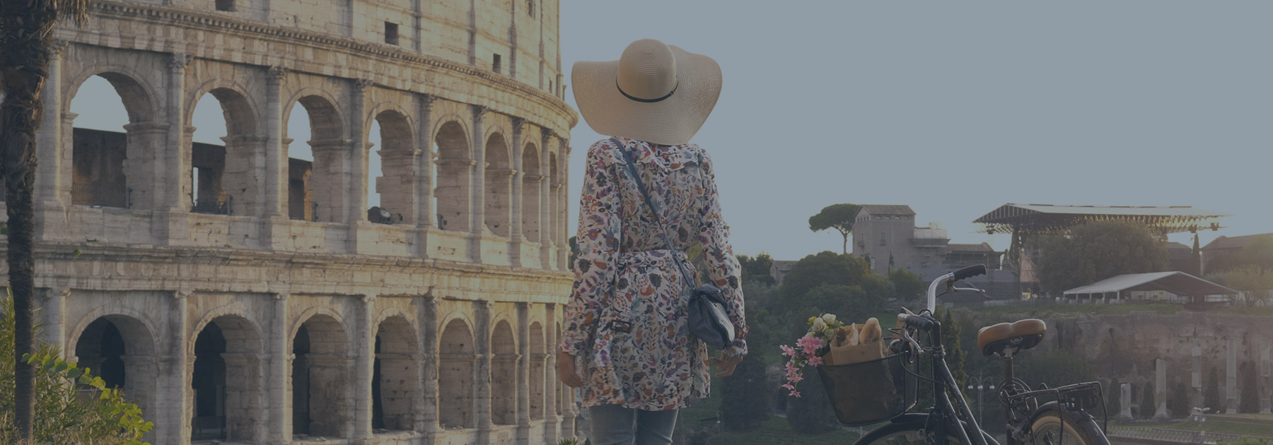 go-today Getaway Travel Promo Woman in front of the Colosseum